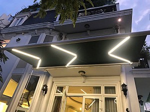 Hệ mái hiên tự động cao cấp tiêu chuẩn Châu Âu che nắng mưa trước cửa biệt thự nhà khách tại Đà Nẵng